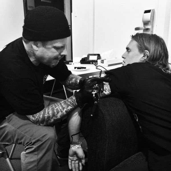 Tommy Breaks getting tattooed