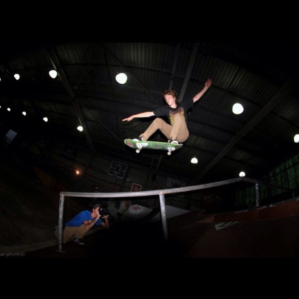 Ollie over rail to flat. Taken